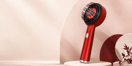 Luxe Haven Scalp Ritual Massager in red on a soft blush background